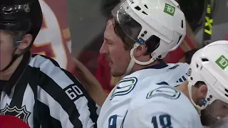 Rough stuff between the Canucks and Flames at the end of the 2nd period