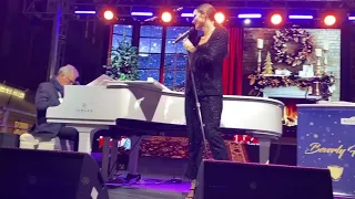 Kat McPhee and David perform 'Singing in the Rain'