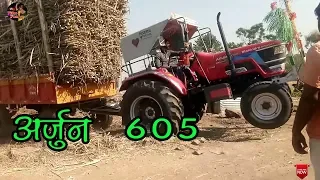 Arjun novo 605 pulling sugarcane trolley