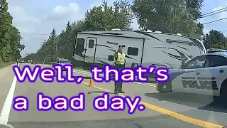 Truck and Travel Trailer in ditch off road - Davison, Michigan