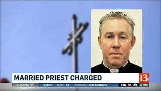 Married priest charged