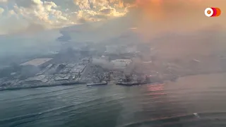 Aerial video over Maui shows smoke rising from fire