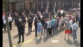 Orange Bands Play 'The Sash' passing St  Patrick's Church in Belfast
