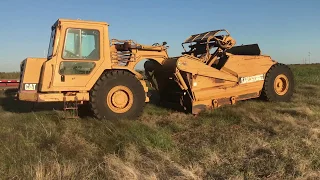 How to drive and grease a scraper CAT 613C