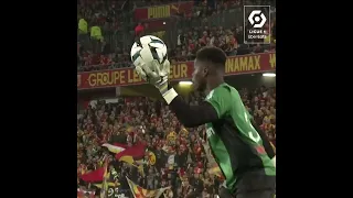 Brice Samba from RC LENS CATCHES BALL WITH ONE HAND. Is unbelievable.