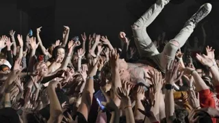 Machine Gun Kelly crowd surfing