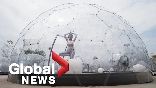 Coronavirus: Yoga enthusiasts bend the rules at hot yoga dome pop-up in Toronto