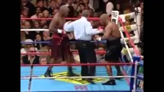 Tyson knocks opponent out cold,  helps him up