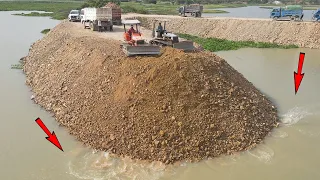 Activity incredible best Operator Showing Technique In Lake Making Road Bulldozer Push Yellow Stone