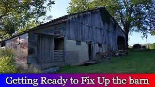 Cleaning up the old barn, so we can fix it up.
