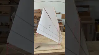 An improved balanced lug sail