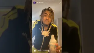 Lil pump spills his lean When flexxing chain