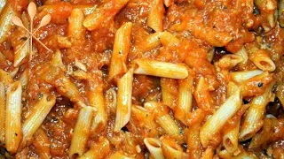 Pasta (macaroni) with tuna and tomato sauce