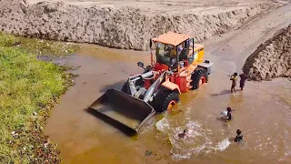 Good action! Heavy Machinery working at Sandfill up Construction Wheel loader, Dump Truck, Bulldozer