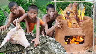 Primitive Technology - building clay stove for cooking pig head