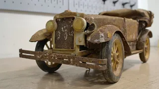 Restoration of an old toy car Phaeton