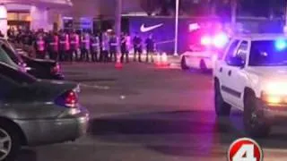 Cops in riot gear break up Orlando shoe riot