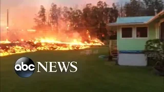 Hawaii volcano spews lava, toxic gases