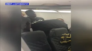 Video shows disruptive passenger on flight to Orlando