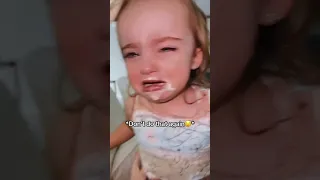TAKING ICE CREAM FROM A TODDLER