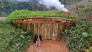 Building complete Survival bushcraft shelter | Bushcraft earth hut, grass roof & fireplace