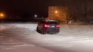 2022 BMW X3 M40i drifting in snow with launch