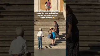 Take care to avoid scamming tactics like this while traveling! Filmed in Rome on the Spanish Steps.