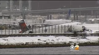 Plane Skids Off Runway At LaGuardia Airport, Crashes Through Fence