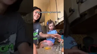 TikTok trend where moms are cracking an egg with their kid’s head