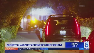 Security guard shot outside music executive's home in Encino