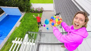 DROPPING 10,000 WATER BALLOONS ON STEPHEN SHARER!! (Family Vacation Prank)
