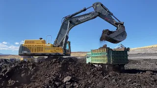 Volvo EC700B Excavator Loading Coal On Trucks