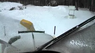 View inside cab of John Deere 3720 blowing snow