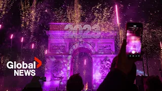 New Year's 2023: Paris, France gets the party started with fireworks smoke show over Arc de Triomphe