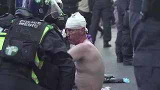 GRAPHIC CONTENT: Rival groups clash at London railway station