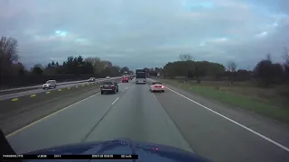 Truck Rolls over with steel coils in Kalamazoo! **Both trucks driving in video stayed on scene.**