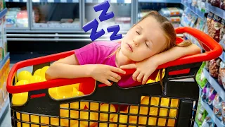 Stephi sleeps in a shopping cart in a grocery store