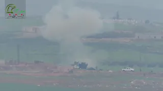 Pro Assad forces abandon their position after their AA truck is hit by a FSA TOW missile.