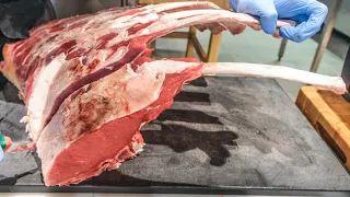 Bistecca Fiorentina. Italian Tomahawk Steak Cooking and Grilling