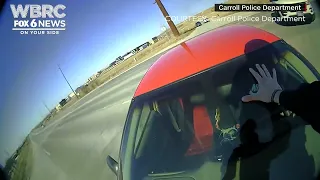 Police officer took a ride on the hood of a speeding car while attempting to stop a fleeing suspect