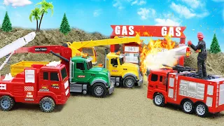 Rescue a burning gas station with a fire truck, crane, and truck | Mega Trucks