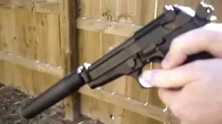 Beretta M92 with silencer suppressor