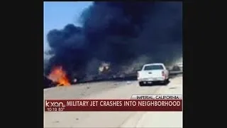 Military jet crash sets homes ablaze in California