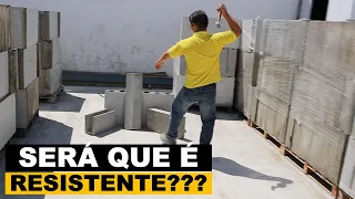 Testando a resistência dos blocos de concreto celular.