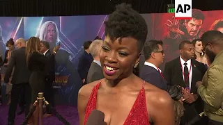 Women 'Avengers' sparkle on purple carpet