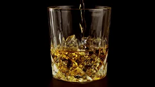 FREE STOCK VIDEO 4K | Pouring Whiskey into Glass with Ice Cubes Stock Footage, Copyright Free