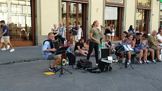 Street performer singing opera in Florence Italy.