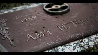 Restoring Memories: Cleaning Amy Freeman's Gravestone and Placing Flowers at Her Grave