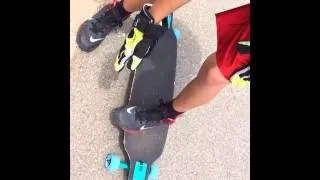 How To Do A Push-up Slide On A Longboard - ThaneForDays