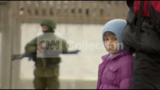 CRIMEA: UNARMED MEN AND UKRAINE TROOPS STANDOFF